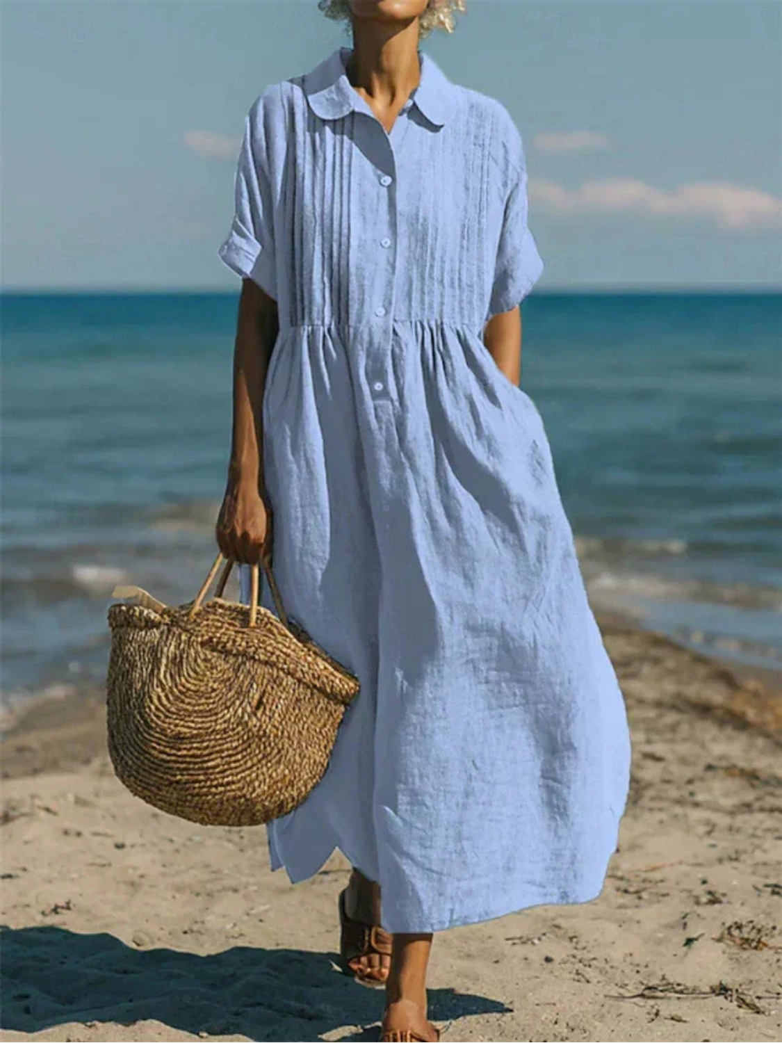 Women's maxi dress featuring a smocked waist and pintuck detailing, made from an elegant linen blend, perfect for summer occasions. 1