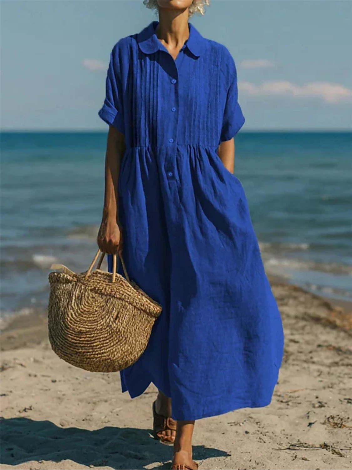Women's maxi dress featuring a smocked waist and pintuck detailing, made from an elegant linen blend, perfect for summer occasions. 2