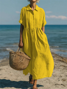Women's maxi dress featuring a smocked waist and pintuck detailing, made from an elegant linen blend, perfect for summer occasions. 6