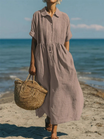 Women's maxi dress featuring a smocked waist and pintuck detailing, made from an elegant linen blend, perfect for summer occasions. 9