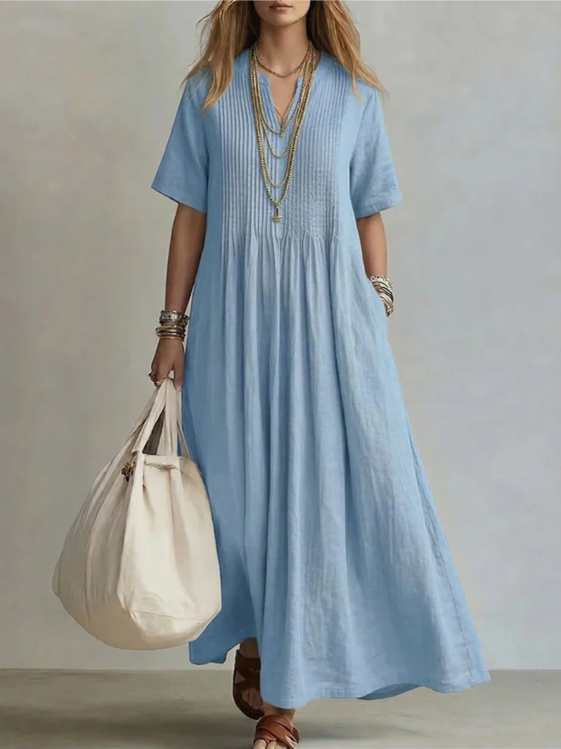 Women's maxi dress featuring a split neck and pintuck details, crafted from a breathable linen blend for ultimate summer comfort. 2