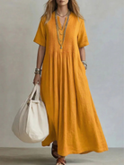 Women's maxi dress featuring a split neck and pintuck details, crafted from a breathable linen blend for ultimate summer comfort. 3