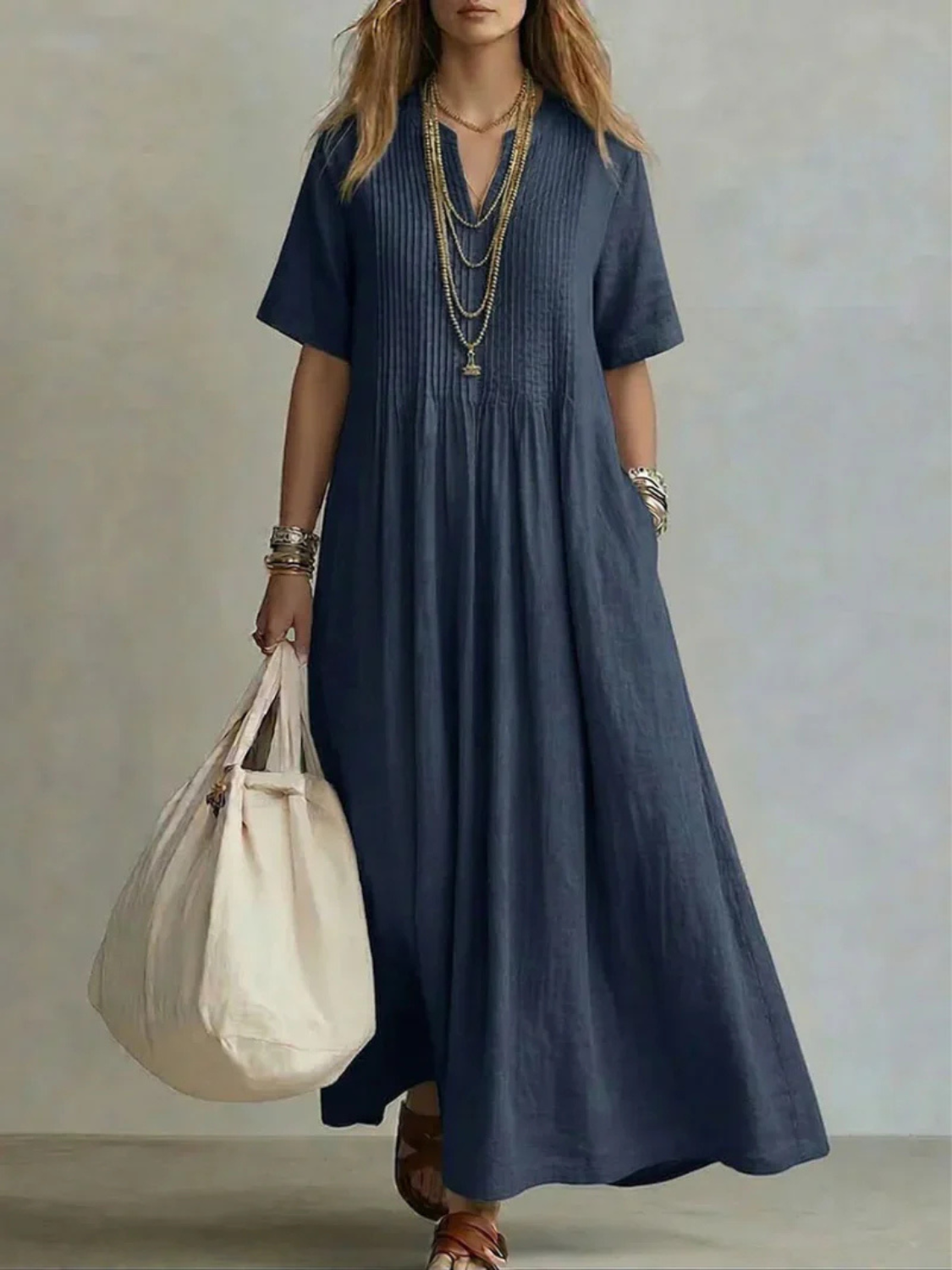 Women's maxi dress featuring a split neck and pintuck details, crafted from a breathable linen blend for ultimate summer comfort. 4