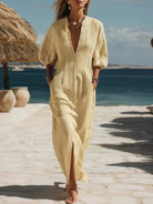 Women's maxi dress featuring a striped button-down front, side pockets, and a lightweight breathable design, perfect for summer wear. 1