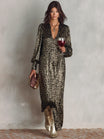 Women's maxi evening dress featuring a elegant V-neck design, shimmering fabric, and a minimalist style, perfect for formal occasions and evening events. 2