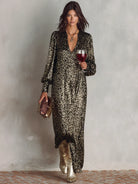 Women's maxi evening dress featuring a elegant V-neck design, shimmering fabric, and a minimalist style, perfect for formal occasions and evening events. 2