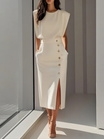 Women's midi dress featuring stylish button detail and a front slit, designed for elegance with sleeveless design and functional side pockets. 0