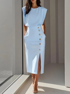Women's midi dress featuring stylish button detail and a front slit, designed for elegance with sleeveless design and functional side pockets. 1