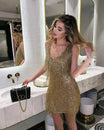 Women's mini dress featuring a V-neck sleeveless design and fringe hem, embellished with sequins, perfect for cocktail parties and special occasions. 2