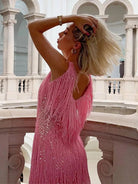 Women's mini dress featuring a V-neck sleeveless design and fringe hem, embellished with sequins, perfect for cocktail parties and special occasions. 4