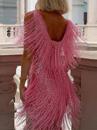 Women's mini dress featuring a V-neck sleeveless design and fringe hem, embellished with sequins, perfect for cocktail parties and special occasions. 5