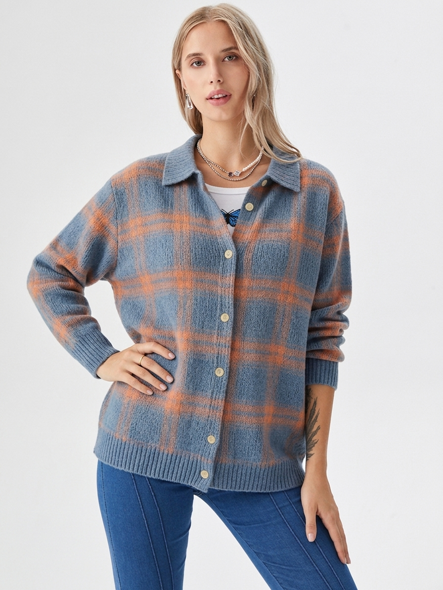 Women's oversized plaid cardigan featuring a button-down closure, designed for a relaxed fit, perfect for casual fall styling. 0