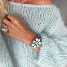 Women's oversized sweater in a soft mohair blend, perfect for cozy winter comfort with a relaxed fit and stylish knit design. 4