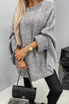 Women's oversized sweater featuring batwing sleeves and a stylish crew neck, crafted from soft knit fabric for a cozy fit, perfect for casual outings or lounging at 1