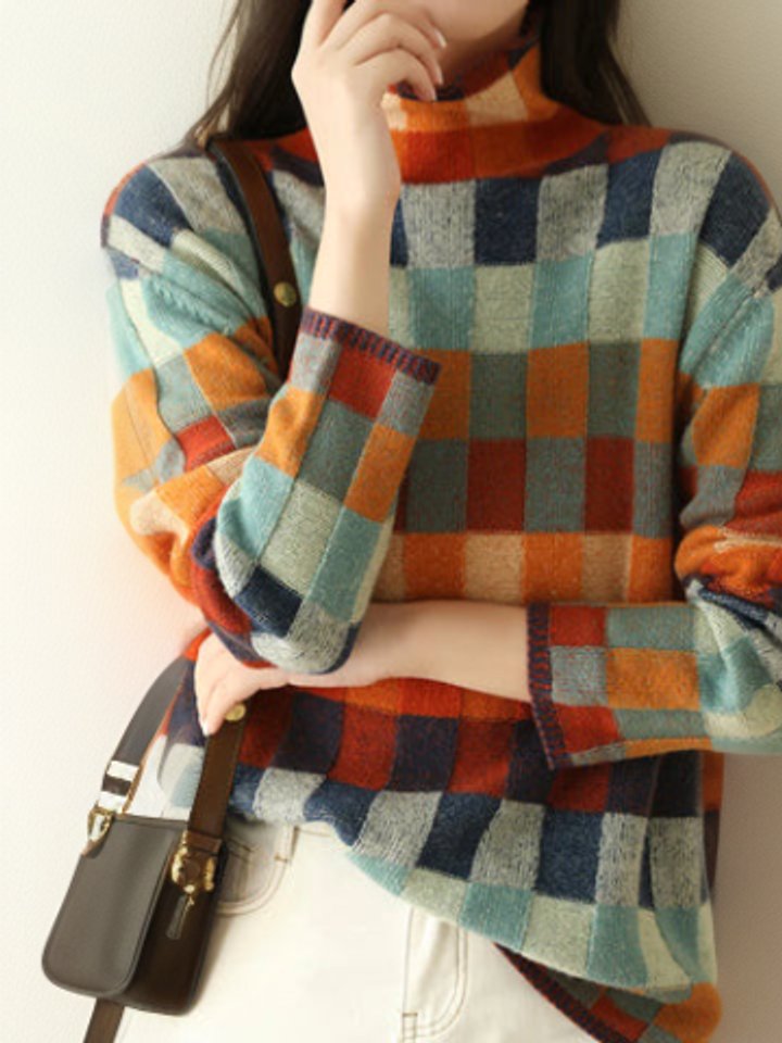Women's oversized sweater featuring a cozy mock turtleneck, colorblock design in vibrant orange, navy, teal, and gray, perfect for stylish fall and 1