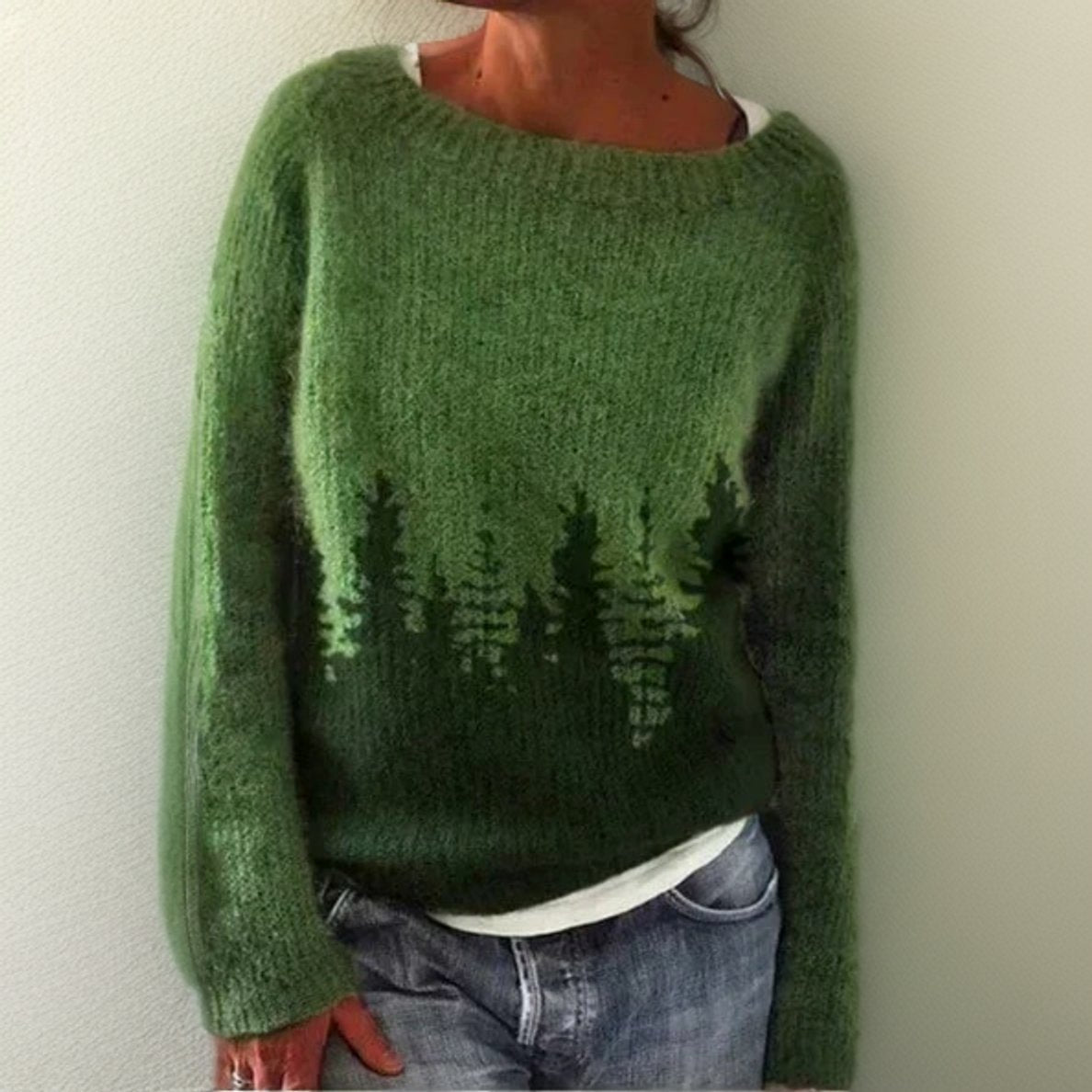 Women's oversized sweater featuring a beautiful forest print, perfect for cozy fall and winter wear with long sleeves and a relaxed fit. 0