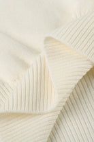 Women's oversized sweater featuring a lightweight knit fabric, off-shoulder design, and stylish ribbed hem for a comfortable and chic look. 5