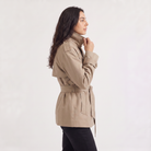 Women's oversized trench coat featuring a structured design, made from a warm wool blend, perfect for casual and smart-casual outfits. 4