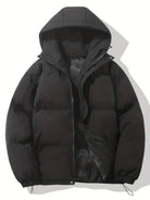Women's black puffer jacket with hood and zip pockets, featuring a quilted design, suitable for cold weather, available in sizes S-3XL. 0
