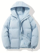 Women's black puffer jacket with hood and zip pockets, featuring a quilted design, suitable for cold weather, available in sizes S-3XL. 1
