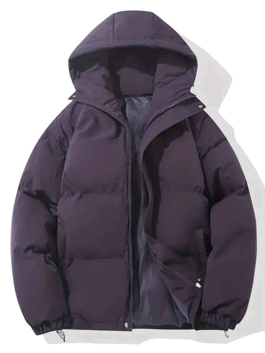 Women's black puffer jacket with hood and zip pockets, featuring a quilted design, suitable for cold weather, available in sizes S-3XL. 2