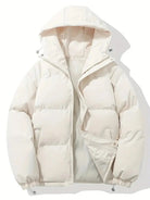 Women's black puffer jacket with hood and zip pockets, featuring a quilted design, suitable for cold weather, available in sizes S-3XL. 3