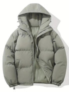 Women's black puffer jacket with hood and zip pockets, featuring a quilted design, suitable for cold weather, available in sizes S-3XL. 5