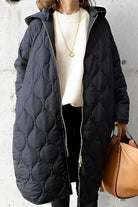 Women's quilted winter coat with hood in versatile black, perfect for cold-weather outerwear, featuring a stylish design and comfortable fit. 1