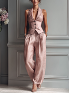 Women's blush pink linen set featuring a sleeveless vest and wide-leg pants, designed for a relaxed fit and comfortable style. 4