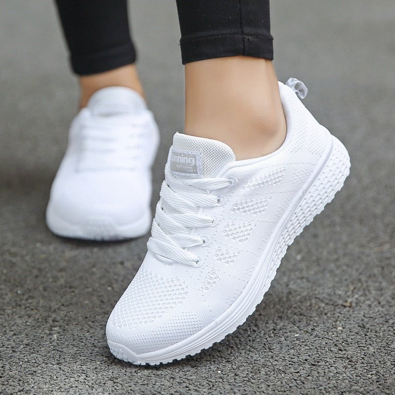 Women's sneakers featuring arch support and breathable mesh, designed for comfort and optimal airflow, ideal walking shoes for women with a wide toe box. 0