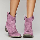 Women's suede western boots featuring a low heel and round toe, perfect for versatile everyday wear and stylish comfort. 5