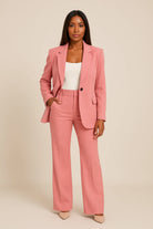 Women's tailored fit suit set in elegant autumn winter style, featuring a structured design perfect for work and formal events. 1