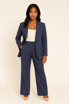 Women's tailored fit suit set in elegant autumn winter style, featuring a structured design perfect for work and formal events. 4