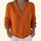 Women's V-Neck Long Sleeve Sweater in soft knit, featuring a relaxed fit ideal for versatile layering in any wardrobe. 4