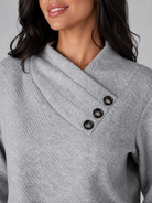 Women's sweater featuring an asymmetric shawl collar and stylish button detail, crafted from soft textured knit for ultimate comfort and warmth. 4