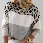 Women's soft knit sweater featuring a trendy color block design and stylish leopard print, perfect for casual everyday wear. 2