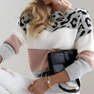 Women's soft knit sweater featuring a trendy color block design and stylish leopard print, perfect for casual everyday wear. 4