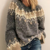 Women's cozy crew neck sweater featuring a stylish Fair Isle jacquard pattern, perfect for fall and winter wear. 2