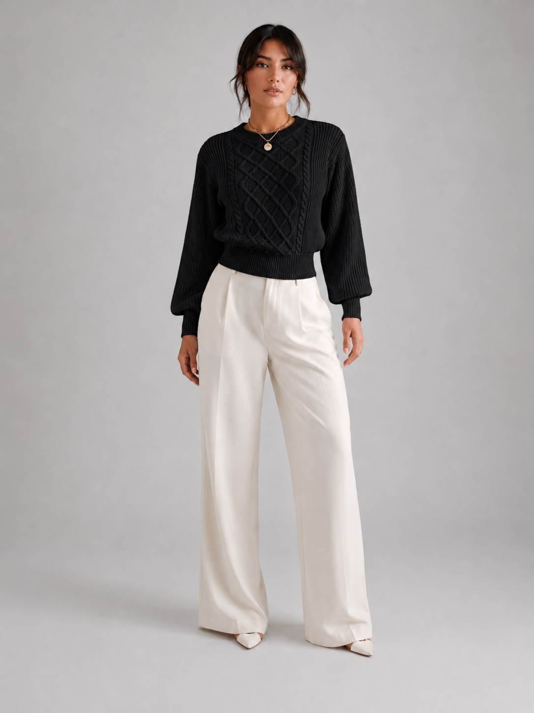 Women's sweater featuring stylish lantern sleeves, a cozy cable knit design, and a comfortable crew neck, available in five vibrant colors. 2
