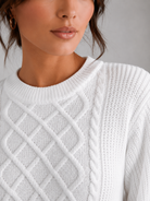 Women's sweater featuring stylish lantern sleeves, a cozy cable knit design, and a comfortable crew neck, available in five vibrant colors. 6