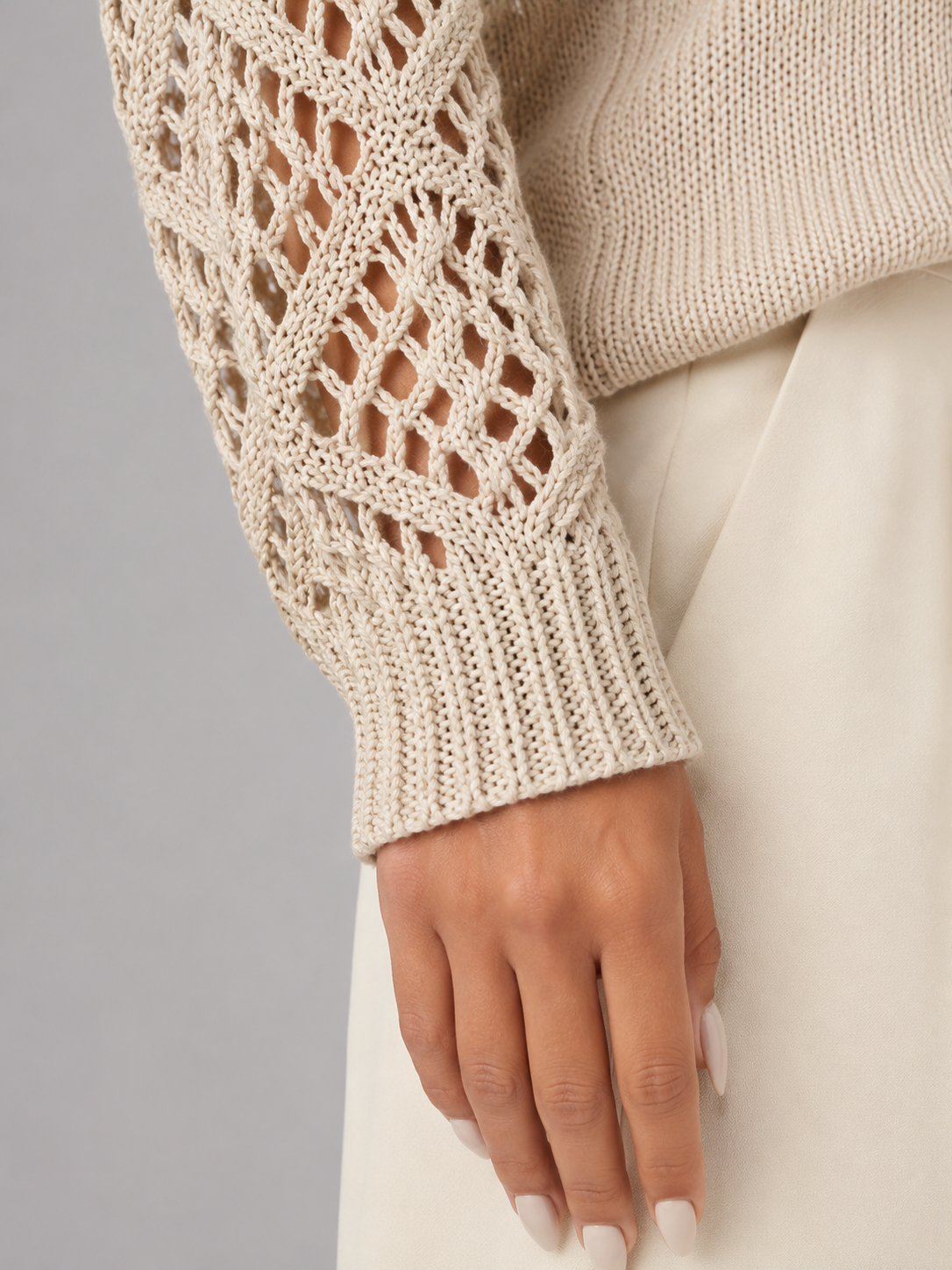 Women's sweater featuring open mesh sleeves and a stylish V-neck design, made from soft brushed knit for a relaxed fit, perfect for casual or layered outfits. 6