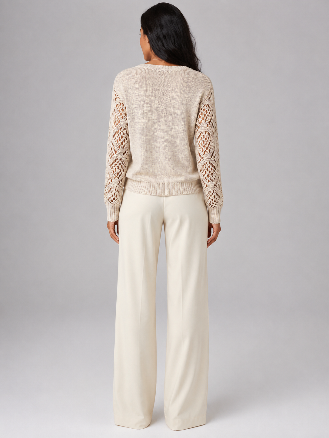 Women's sweater featuring open mesh sleeves and a stylish V-neck design, made from soft brushed knit for a relaxed fit, perfect for casual or layered outfits. 7