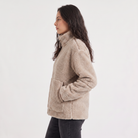 Women's Teddy Fleece Jacket in oversized fit with full-length zip and front pockets, perfect for cozy layering in colder weather. 3