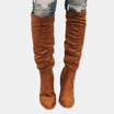 Women's thigh high boots featuring a cushioned insole and block heel, designed with a sleek over-the-knee silhouette for stylish comfort. 2