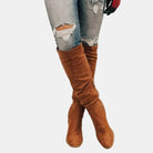 Women's thigh high boots featuring a cushioned insole and block heel, designed with a sleek over-the-knee silhouette for stylish comfort. 7