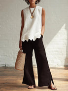 Women's sleeveless blouse featuring a scalloped hem and round neck, made from lightweight linen-style fabric for a relaxed fit, perfect for warm weather and casual 0