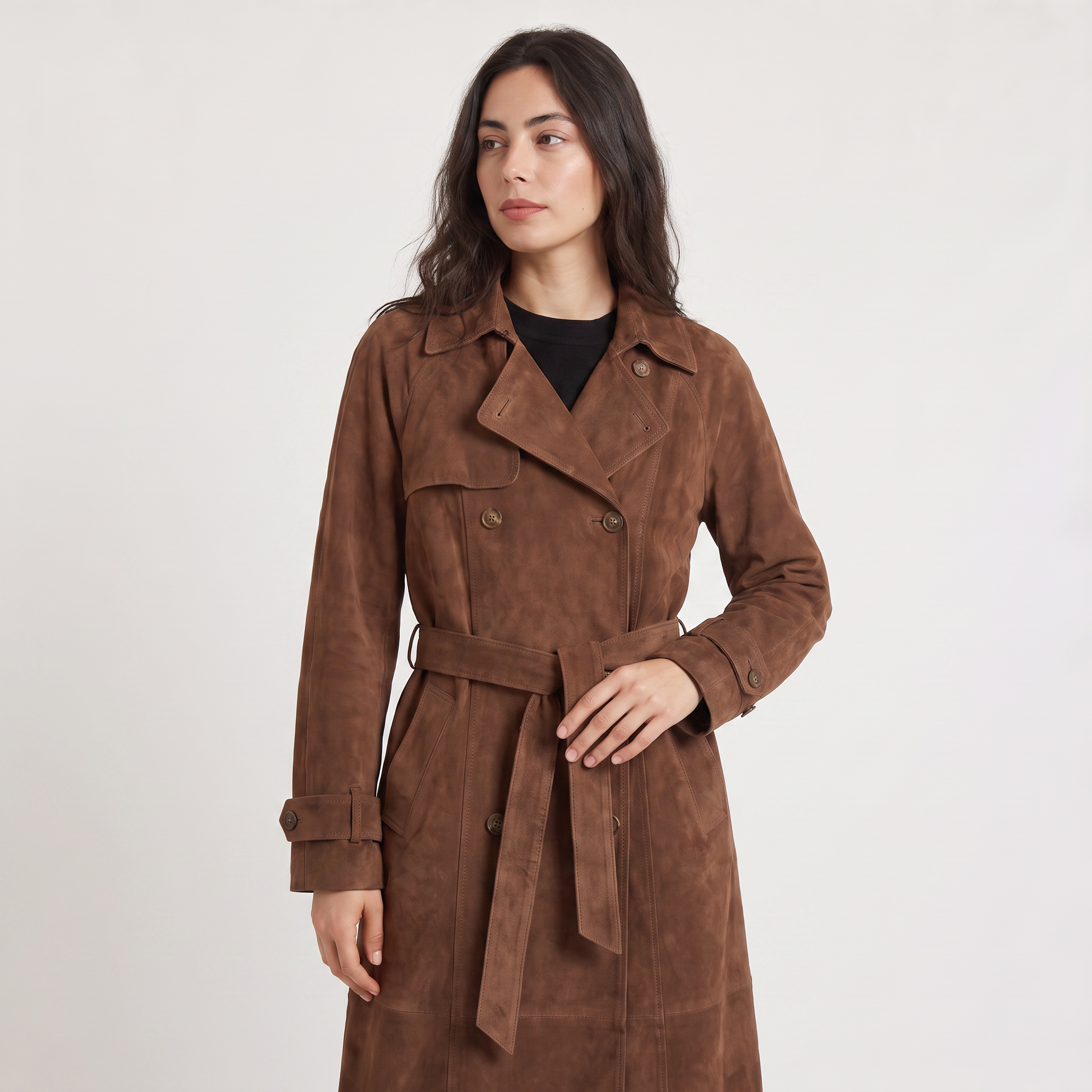 Women's trench coat featuring an adjustable belt, classic lapel collar, and a slim fit longline design in soft faux suede. 2