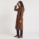 Women's trench coat featuring an adjustable belt, classic lapel collar, and a slim fit longline design in soft faux suede. 3