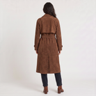 Women's trench coat featuring an adjustable belt, classic lapel collar, and a slim fit longline design in soft faux suede. 4