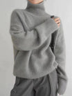Women's turtleneck sweater featuring a chunky knit design, made from 100% wool, perfect for cozy warmth in fall and winter, with long sleeves 2
